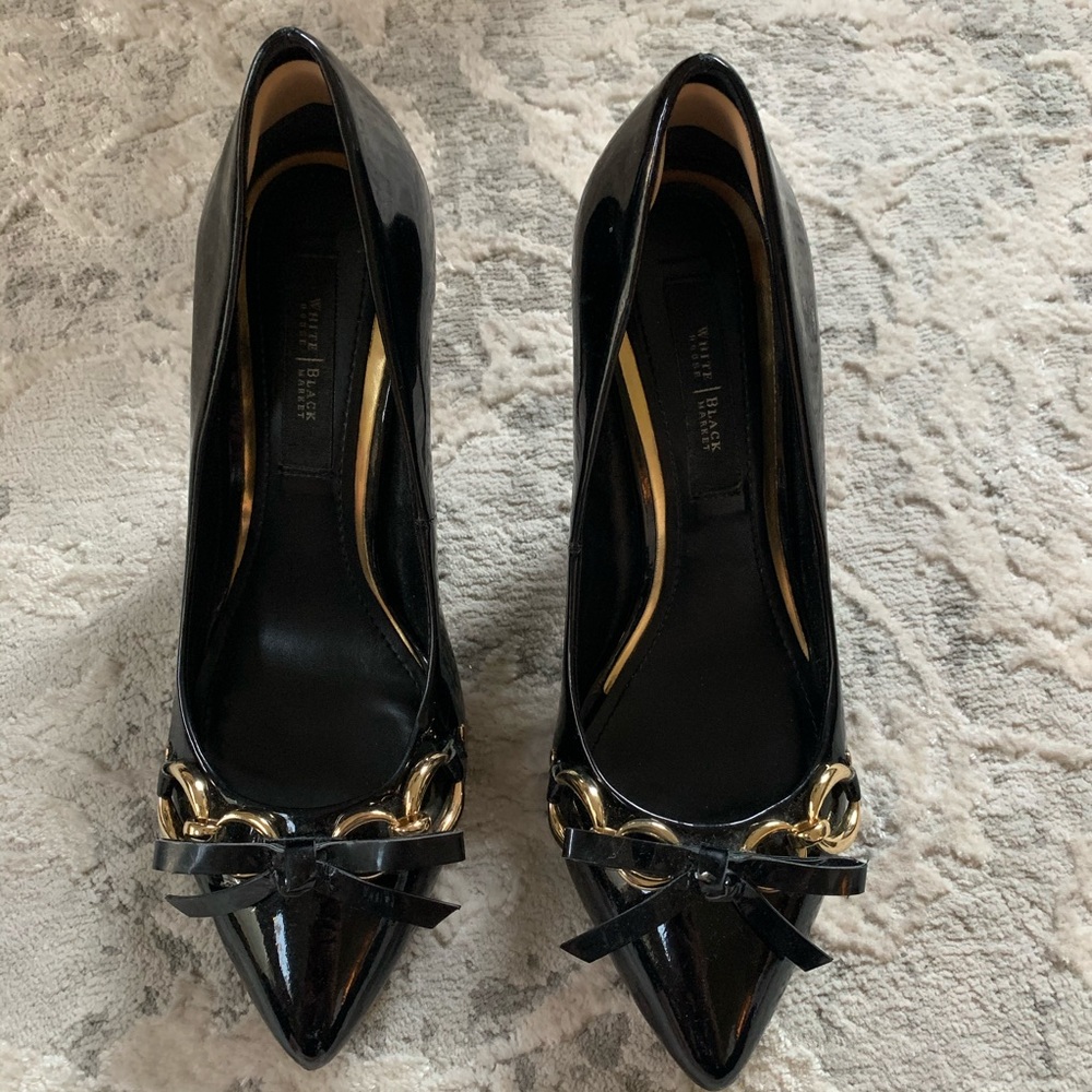 Black heels with gold accent